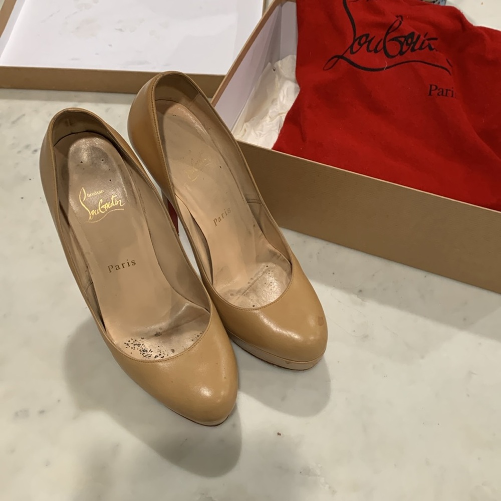 Christian Louboutin Heels. Worn and loved but still great looking and condition!